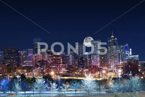 Denver skyline west side. night in colorado. downtown denver with moon. unite Stock Photos