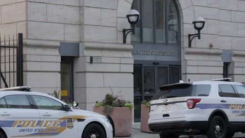 Denver US Mint Exterior Close Up on Door with Police Cars Stock Footage 85197816