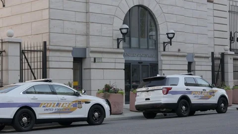 Denver US Mint Exterior Close Up on Police Cars with Pedestrian Stock Footage 85204543