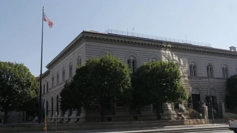 Denver US Mint Exterior View with Traffic and Waving Flag Stock Footage 85198486