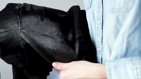 Deodorant stains on black clothe Stock Footage 296405535