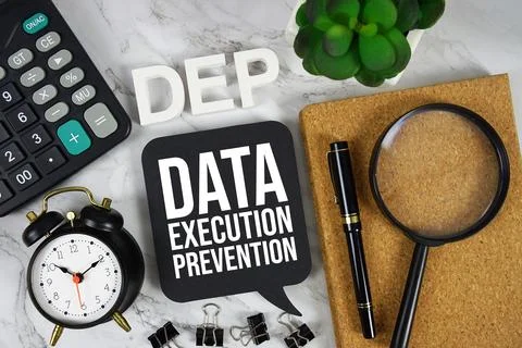 DEP Data Execution Prevention text with Calculator, alarm clock and magnify.. Stock Photos