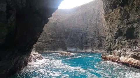 Departing Open Ceiling Cave by boat on the Na Pali Coast, Kauai, Hawaii Stock Footage 299965730