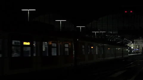 Departing train at night Stockbeeldmateriaal 43089958