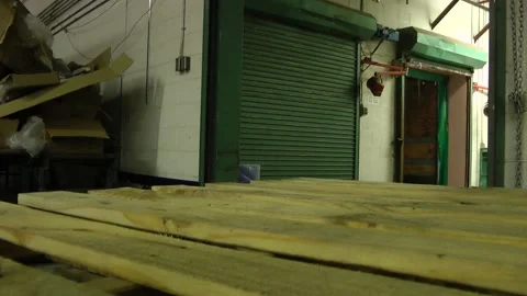 Department store loading dock worker walks by Stock Footage 131666772