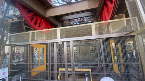 Departure of an elevator going down in the Eiffel Tower in Paris, France Stock Footage 197111546