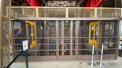Departure of an elevator going down in the Eiffel Tower in Paris, France Stock Footage 199453954