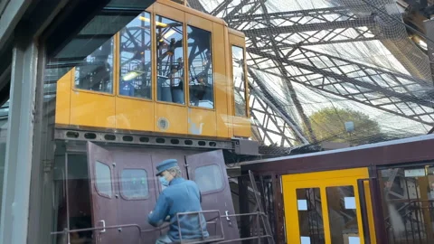Departure of an elevator going up in the Eiffel Tower in Paris, France Stock Footage 196151239