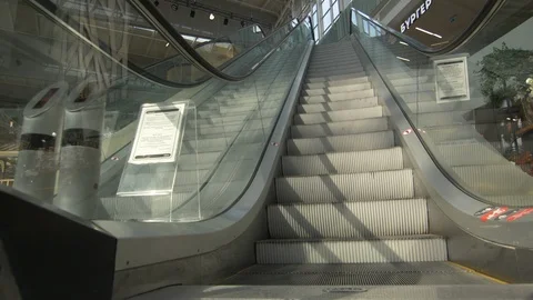 Departure from the Escalator Stock Footage 123496139