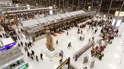 Departures hall and check-in counters at Suvarnabhumi Airport. Video stock 89570827