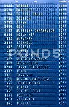 Depature schedule board in airport Stock Photos