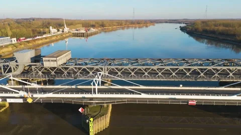 On depicts parallel modern white road bridge heavy steel truss crossing glassy Video stock 328193686