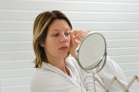 Depilating the eyebrow Stock Photos