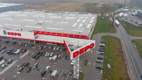 Depo store in Lithuania with massive logo, aerial descend view Stock Footage 255221304