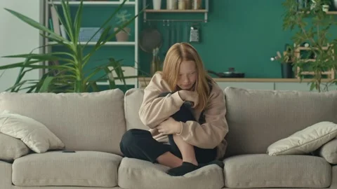 A Depressed and Desperate Red-haired Teenage Girl in Stress, Mental Health. Stock Footage 163553096