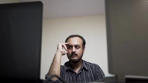 Depressed and exhausted man in the office Stock Footage 145596242