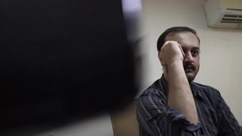 Depressed and exhausted man in the office Stock Footage 145596251