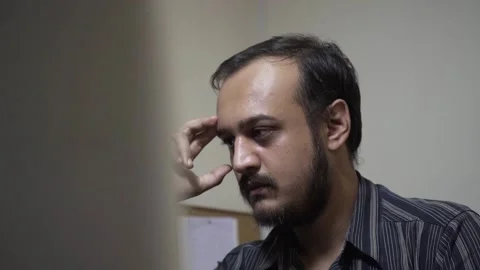 Depressed and exhausted man in the office Stock Footage 145596257