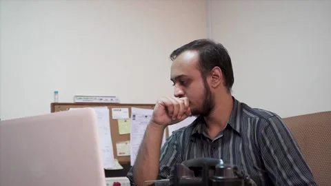 Depressed and exhausted man in the office Stock Footage 145596360