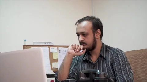 Depressed and exhausted man in the office Stock Footage 145596459
