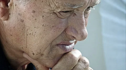 Depressed and pensive old man deep in his thoughts Stock-Footage 64307461