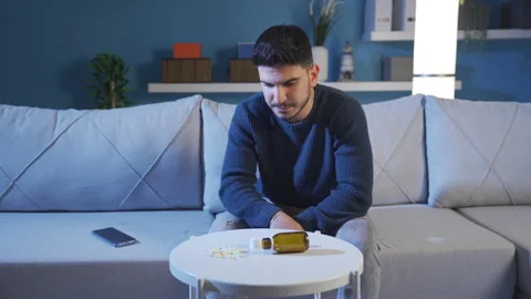 Depressed and sad man is thinking of committing suicide. Video stock 236243148