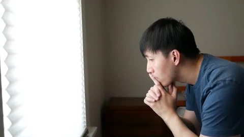Depressed Asian man with negative thoughts Stock-Footage 248665501