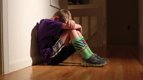 Depressed Boy Against a Wall Stock Footage 68000781