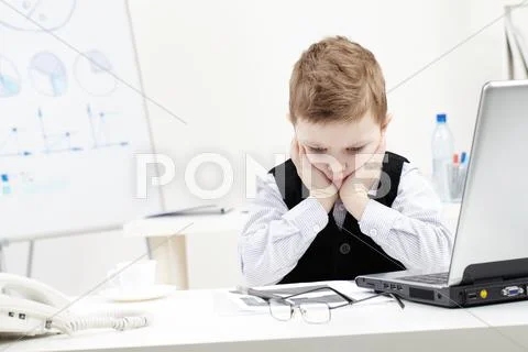 Depressed business boy thinking over difficult task Stock Photos