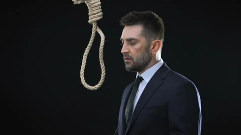 Depressed businessman putting rope loop over neck committing suicide, bankruptcy 스톡 동영상 107741616
