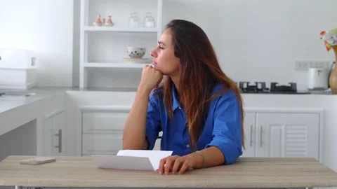 Depressed freelancer remote worker reading notice of fraud dismissal Stock Footage 176263645