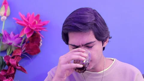 Depressed guy drinking alcohol Stock Footage 157791233