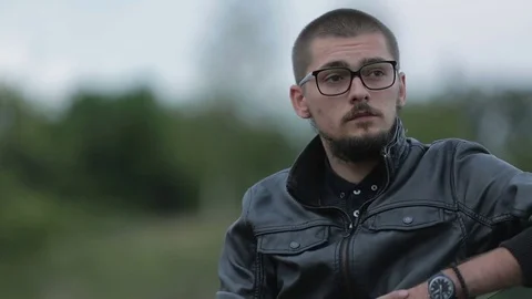 Depressed guy looks into the distance Stock Footage 71583522