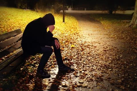 Depressed man on bench Stock Photos