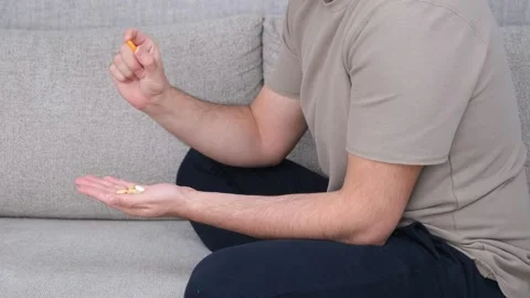 Depressed man pill Stock Footage 266687018