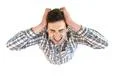 The depressed man shout on the white background. View from above Photo