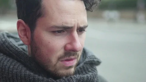 Depressed man sitting in a cafe, feeling upset, worried and thinking about Stock Footage 120115708