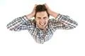 The depressed man stand on the white background. View from above Photo