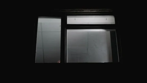 Depressed man standing on window sill ready to leap through window, suicide Stock Footage 98970058