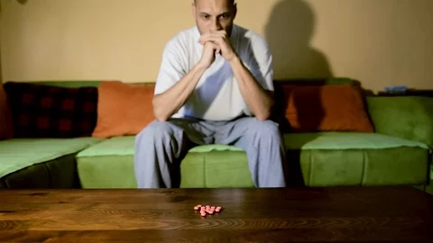 Depressed man suffering from suicidal depression want to commit suicide overdose 스톡 동영상 111644839