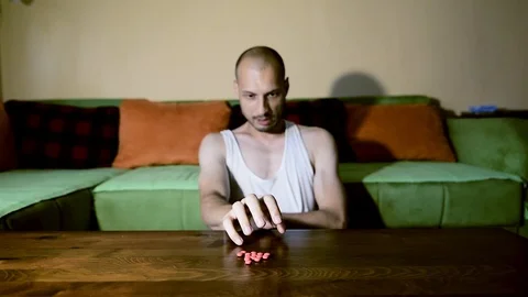 Depressed man suffering from suicidal depression want to commit suicide overdose 스톡 동영상 111644930