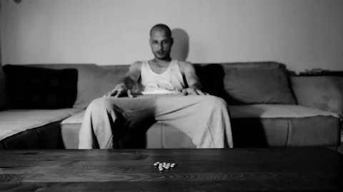 Depressed man suffering suicidal depression want to commit suicide by overdose 스톡 동영상 112013289
