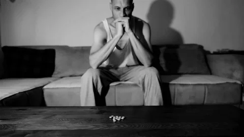 Depressed man suffering suicidal depression want to commit suicide by overdose 스톡 동영상 112013290