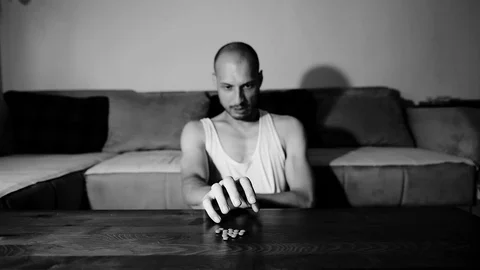 Depressed man suffering suicidal depression want to commit suicide by overdose 스톡 동영상 112013356