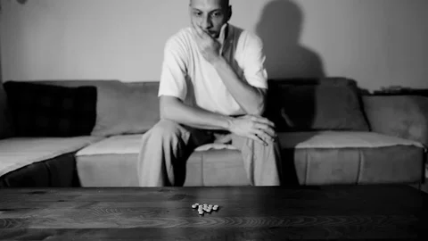 Depressed man suffering suicidal depression want to commit suicide by overdose 스톡 동영상 112013358