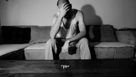 Depressed man suffering suicidal depression want to commit suicide by overdose 스톡 동영상 112013371