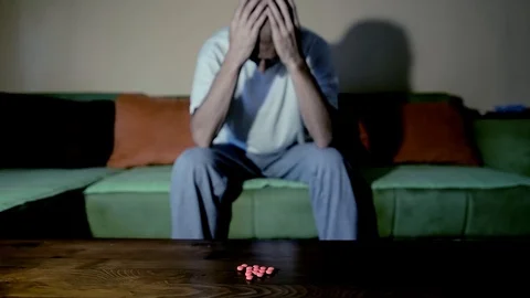 Depressed man suicidal depression commit suicide strong medicament drugs pills 스톡 동영상 111144714