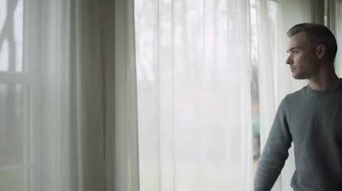 Depressed Man at Window (5 of 9) Stock Footage 45398981