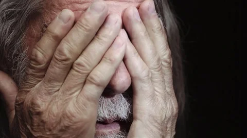 Depressed old man with hands on face,close up Stock Footage 74983047