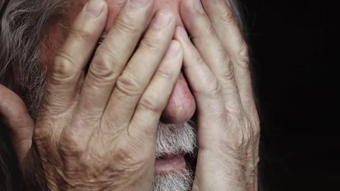 Depressed old man with hands on face,close up Stock Footage 75007973